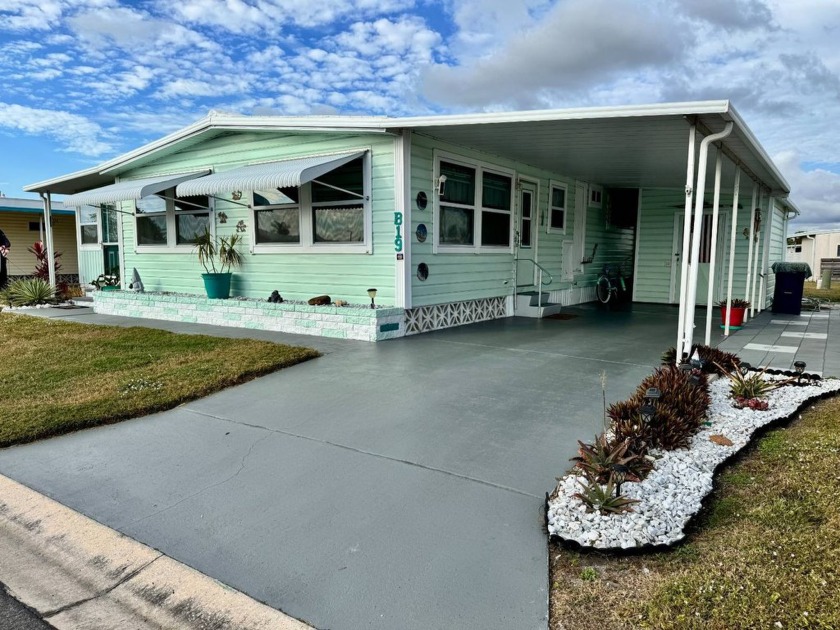 Welcome to this beautifully updated 1973 double-wide home that - Beach Home for sale in Bradenton, Florida on Beachhouse.com