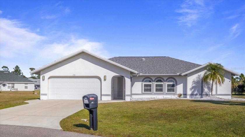 This stunning 4-bedroom, 2-bathroom pool home is located on a - Beach Home for sale in Punta Gorda, Florida on Beachhouse.com