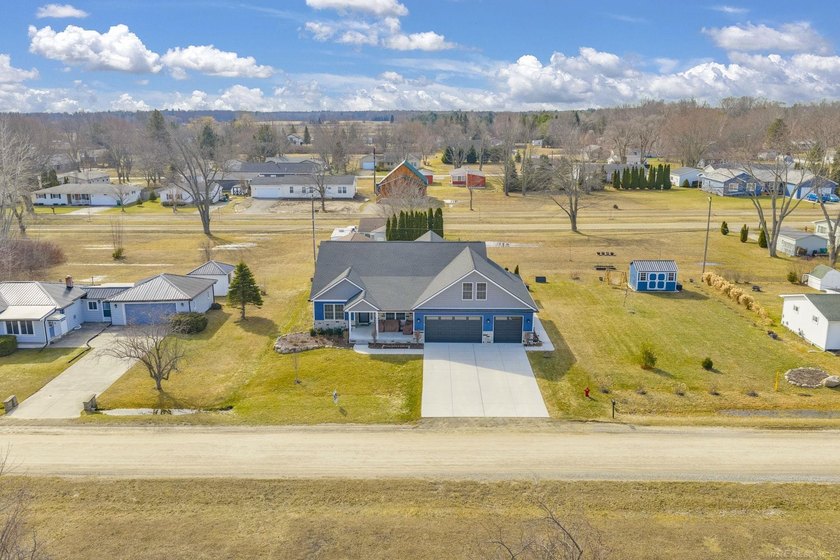 Exceptional custom-built, open concept ranch completed in 2023 - Beach Home for sale in Lexington, Michigan on Beachhouse.com