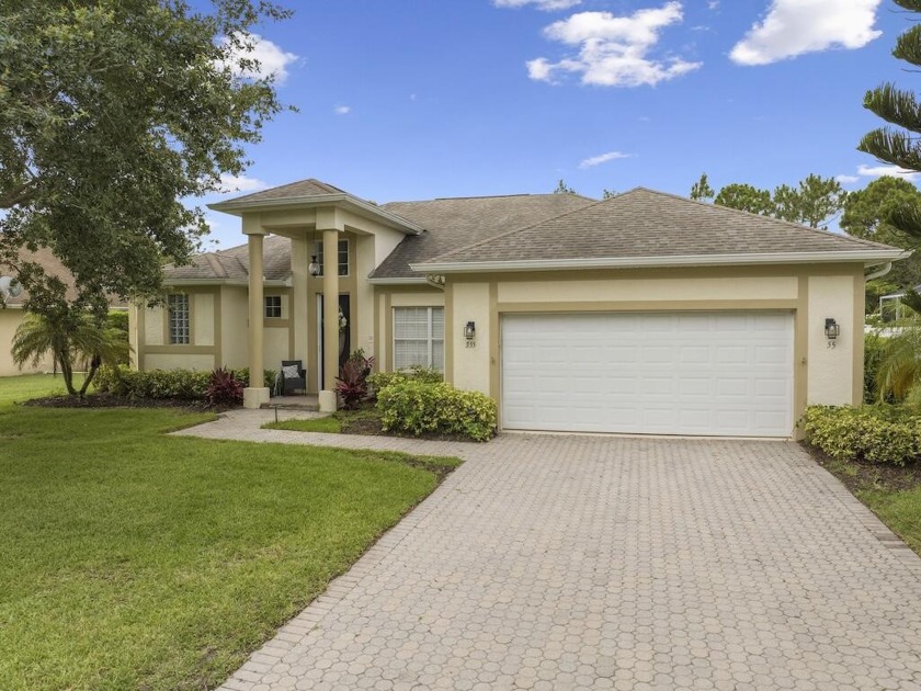 This lovely home features a desirable split floor plan with tile - Beach Home for sale in Vero Beach, Florida on Beachhouse.com