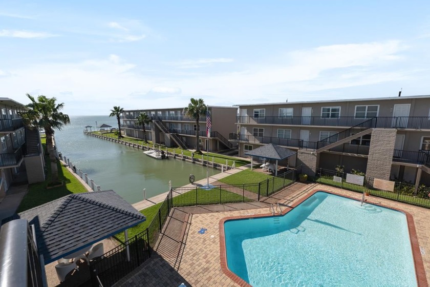 Welcome to Fiesta Harbor, your tranquil bayfront getaway! This - Beach Condo for sale in South Padre Island, Texas on Beachhouse.com