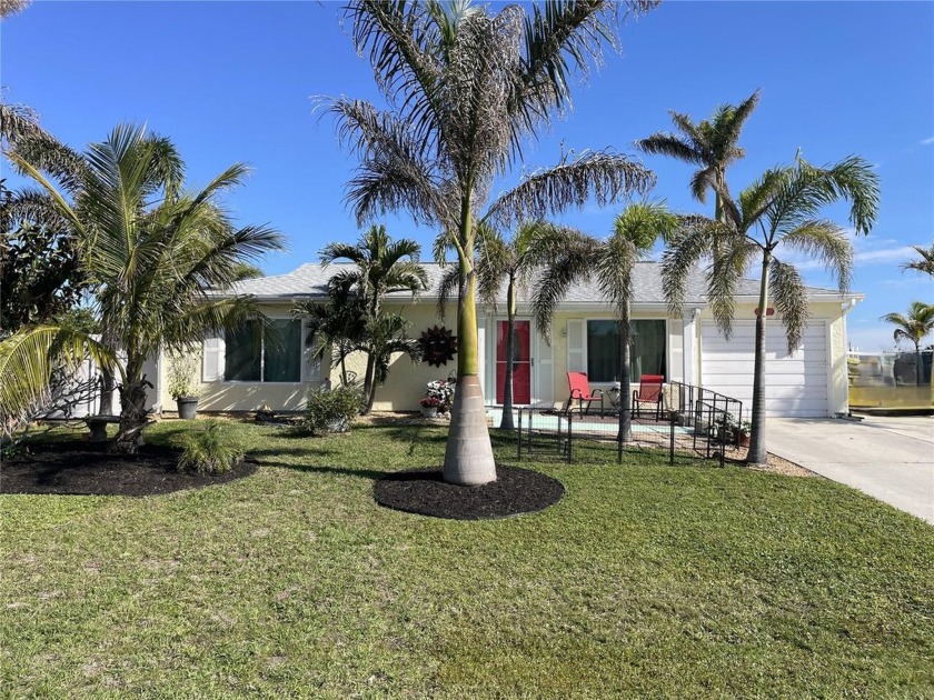 Welcome to this stunning lakefront home, featuring 2 spacious - Beach Home for sale in Port Charlotte, Florida on Beachhouse.com