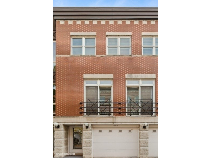 Situated on a quiet tree-lined courtyard in the desirable Harbor - Beach Townhome/Townhouse for sale in Chicago, Illinois on Beachhouse.com