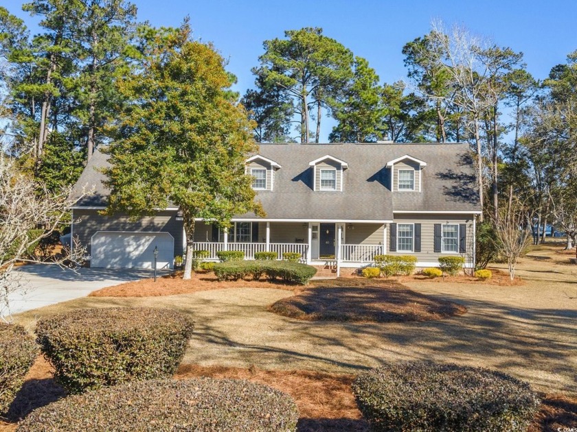 Welcome to this stunning 4-bedroom home nestled in the heart of - Beach Home for sale in Georgetown, South Carolina on Beachhouse.com