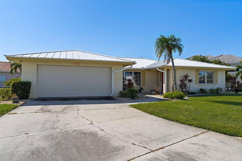 WATERFRONT POOL HOME IN PGI W/SAIL ACCESS - This nostalgic 2 - Beach Home for sale in Punta Gorda, Florida on Beachhouse.com