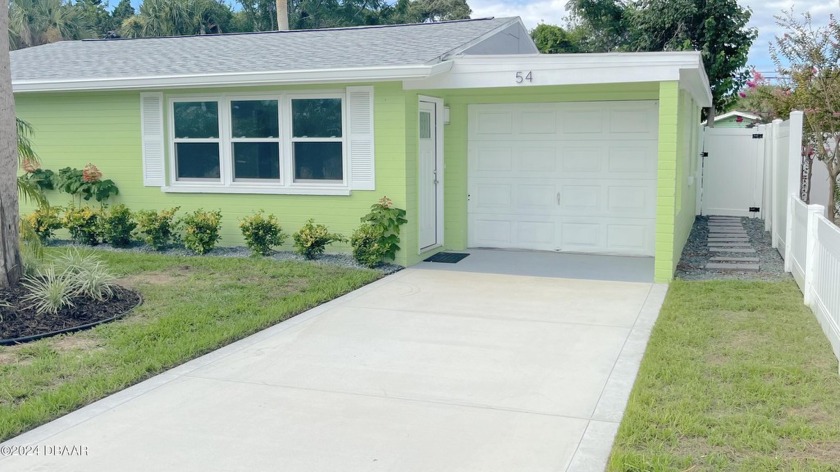 This beautifully renovated home boasts a brand new roof, windows - Beach Home for sale in Ormond Beach, Florida on Beachhouse.com