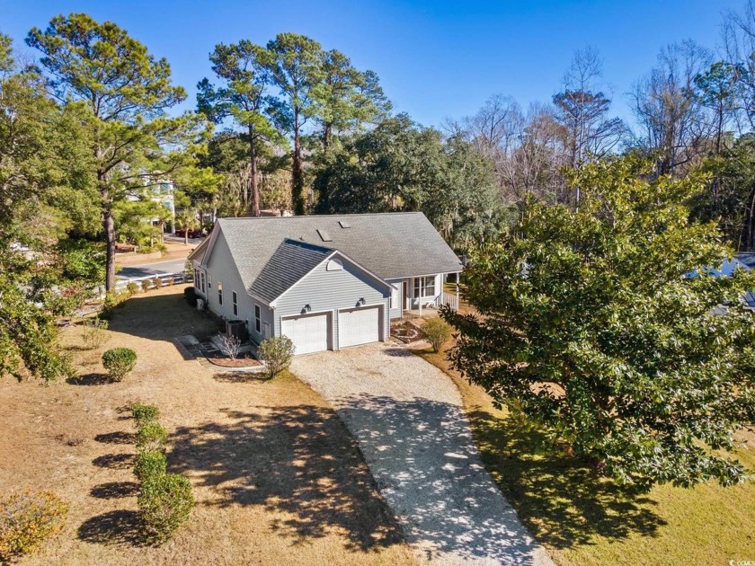 What a lovely home this one is, and it's just minutes from the - Beach Home for sale in Pawleys Island, South Carolina on Beachhouse.com