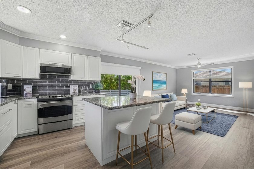 Charming Key West-inspired corner townhome featuring 2 bedrooms - Beach Townhome/Townhouse for sale in Lantana, Florida on Beachhouse.com