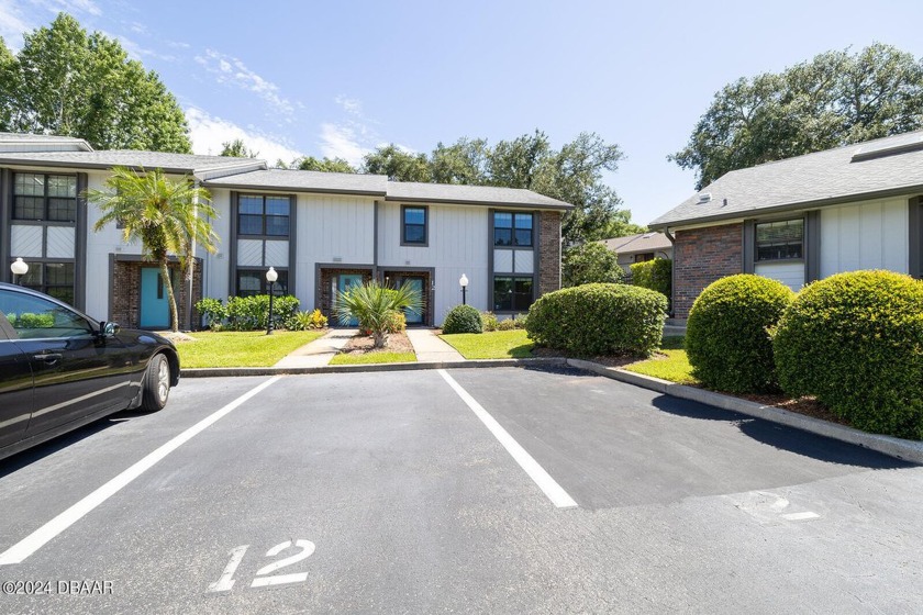 Discover the charm of this two-story corner unit nestled in the - Beach Townhome/Townhouse for sale in Ormond Beach, Florida on Beachhouse.com