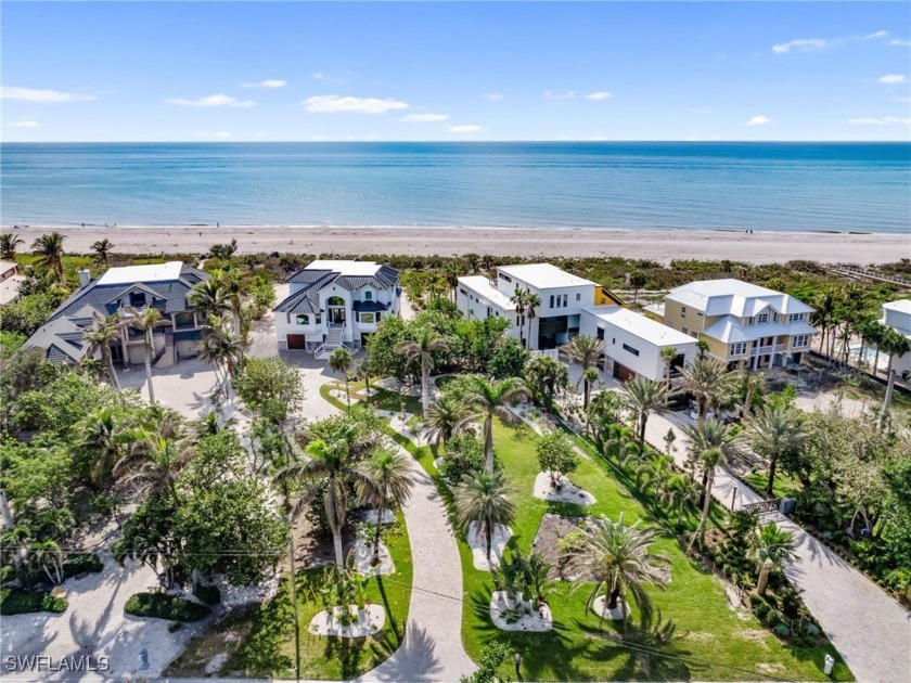 Situated on a high ridge along the exclusive W. Gulf Dr. on - Beach Home for sale in Sanibel, Florida on Beachhouse.com