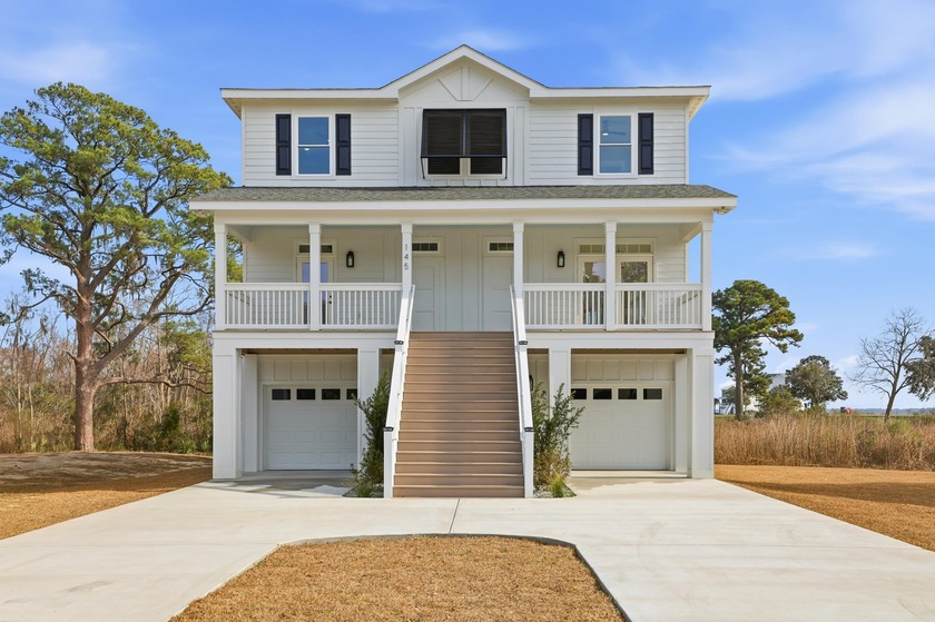Exceptional new construction on Winyah Bay offering sweeping - Beach Home for sale in Georgetown, South Carolina on Beachhouse.com
