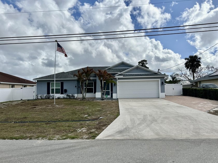 BEAUTIFUL 4 BEDROOM 2 BATH NEWER 2018 BUILT HOME ON CANAL WITH - Beach Home for sale in Port Saint Lucie, Florida on Beachhouse.com