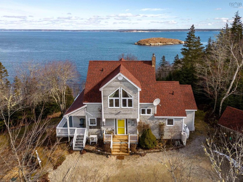 WHERE EAGLES SOAR. Over 5 acres of treed privacy, elevated - Beach Home for sale in Northwest Cove,  on Beachhouse.com