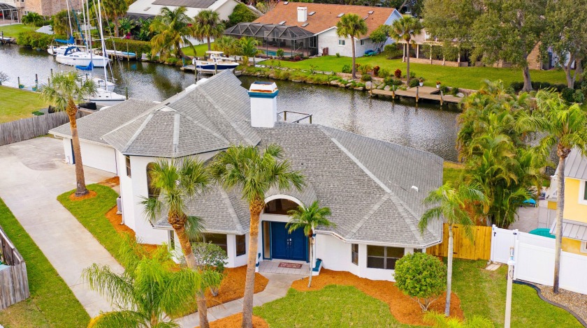 Canal waterfront. Indian Harbour Beach. Pool home in a  Coastal - Beach Home for sale in Indian Harbour Beach, Florida on Beachhouse.com