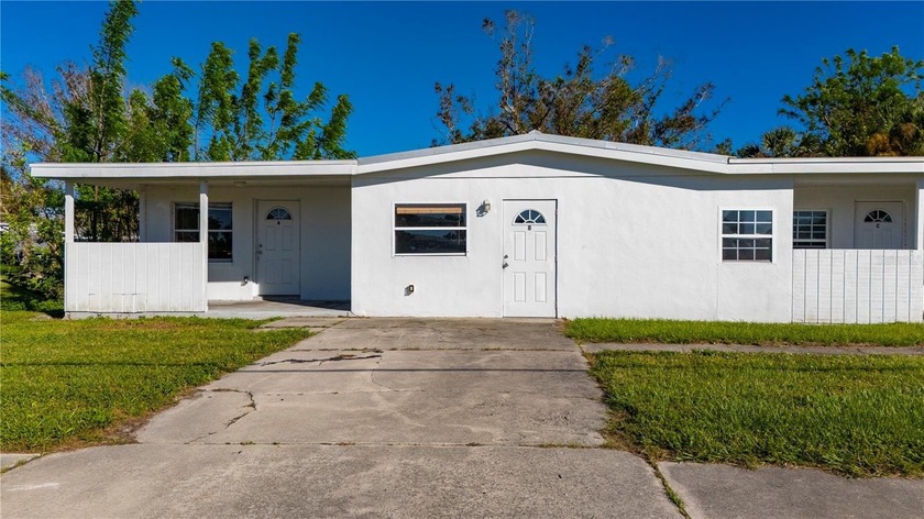 Quadruplex with Metal Roof and is Located in a good Rental Area - Beach Townhome/Townhouse for sale in Punta Gorda, Florida on Beachhouse.com