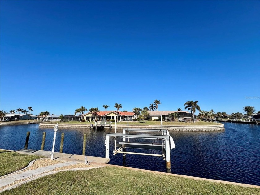 Welcome home to your stunning 116 FEET of SALTWATER FRONTAGE, a - Beach Home for sale in Punta Gorda, Florida on Beachhouse.com