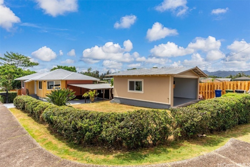 Located in the heart of Wahiawa, this beautiful home sits at the - Beach Home for sale in Wahiawa, Hawaii on Beachhouse.com