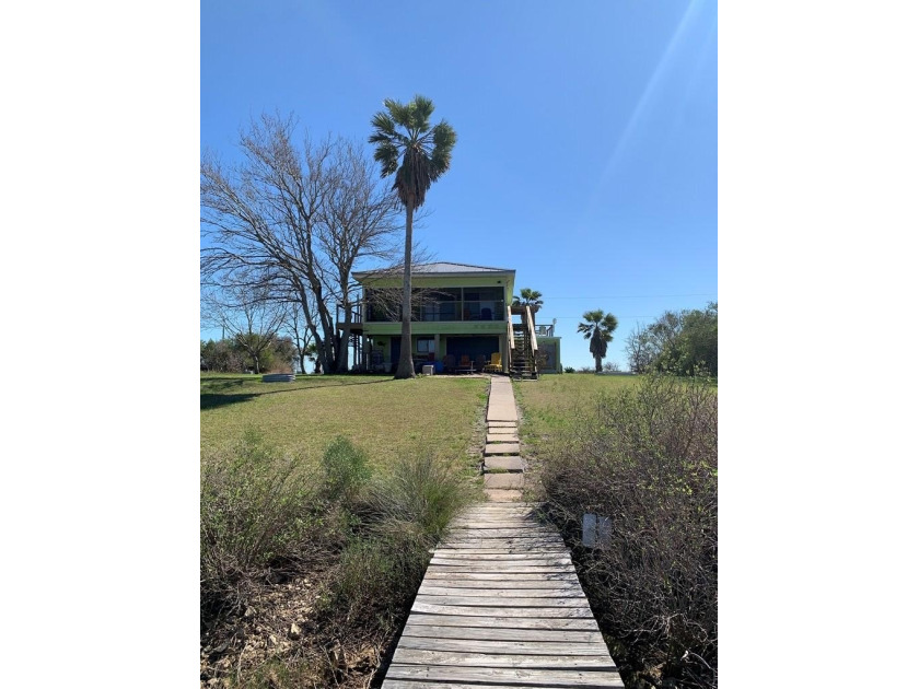 WATERFRONT!! TWO PIERS!! Just over an acre on Five Mile Draw - Beach Home for sale in Palacios, Texas on Beachhouse.com