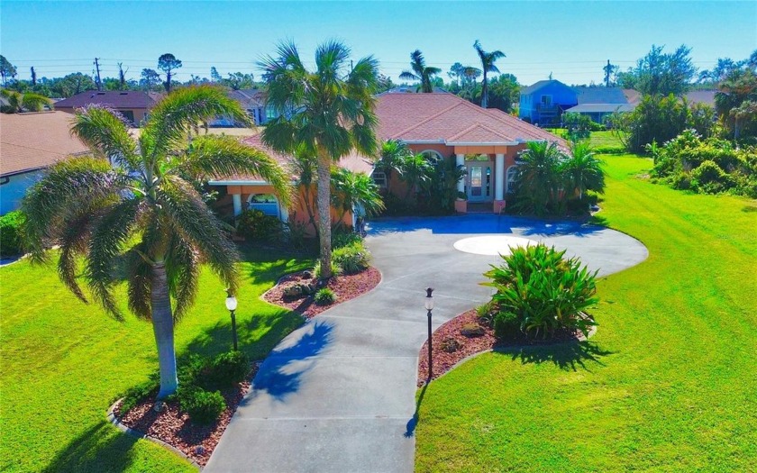 LUSH, LAVISH and LUXURIOUS POOL HOME on a freshwater canal!! - Beach Home for sale in Rotonda West, Florida on Beachhouse.com