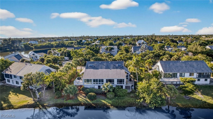Located on a peaceful cul-de-sac in the popular Dunes - Beach Home for sale in Sanibel, Florida on Beachhouse.com