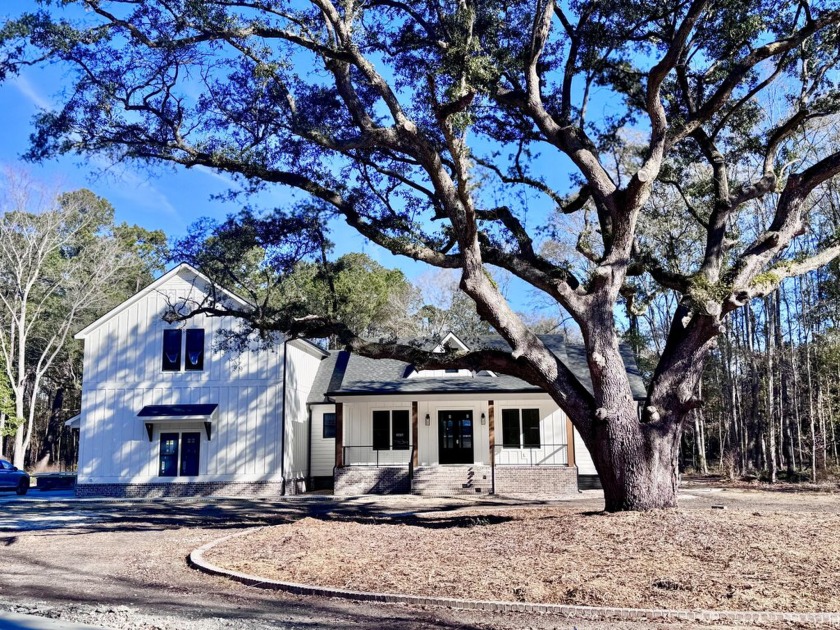 NEW- MOVE IN READY! Discover a rare gem on nearly an acre of - Beach Home for sale in Johns Island, South Carolina on Beachhouse.com