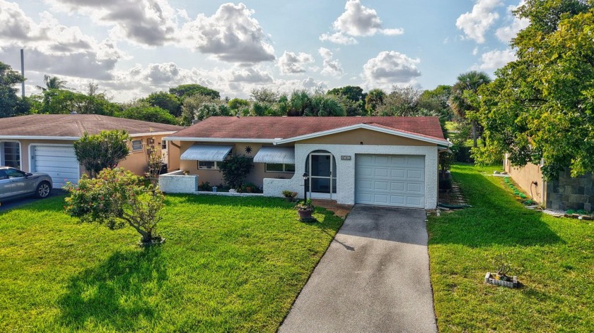 All Ages Welcome! This charming single-family home, nestled in a - Beach Home for sale in Deerfield Beach, Florida on Beachhouse.com