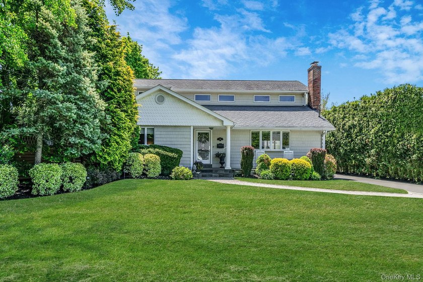 Located at the end of Manitton Court this impeccably maintained - Beach Home for sale in Islip, New York on Beachhouse.com