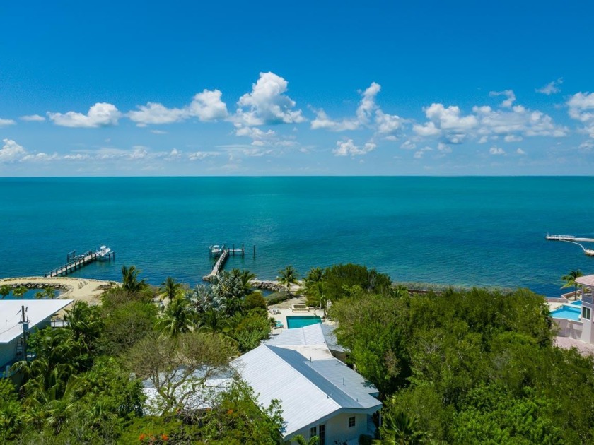 Tropical Bayfront Estate nestled into almost 2 lushly landscaped - Beach Home for sale in Marathon, Florida on Beachhouse.com