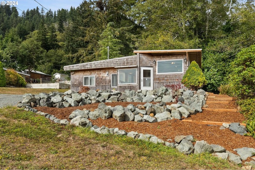 Cozy beach retreat on larger lot with ocean bay views! This - Beach Home for sale in Garibaldi, Oregon on Beachhouse.com