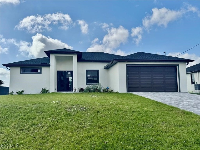 **Stunning New Construction Home in Prime Location!** Welcome to - Beach Home for sale in Cape Coral, Florida on Beachhouse.com