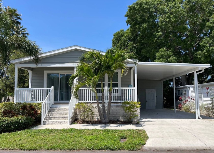 This 5-years-young creekside home on a corner lot in Bayside - Beach Home for sale in Clearwater, Florida on Beachhouse.com