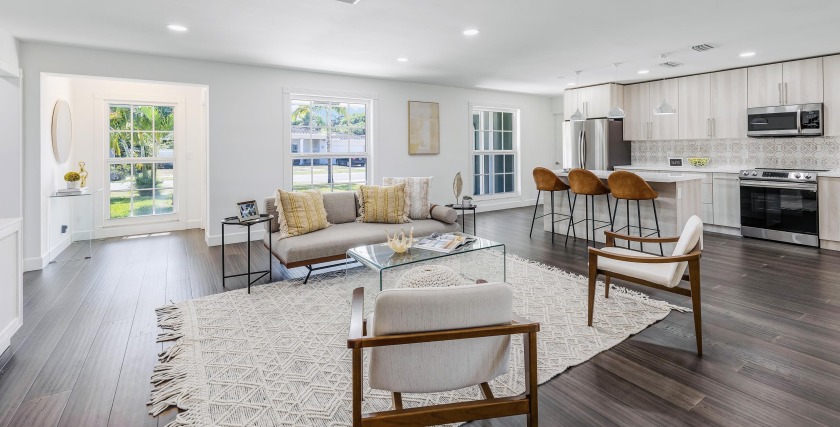Welcome home to this impressively updated three-bedroom, two - Beach Home for sale in Fort Lauderdale, Florida on Beachhouse.com