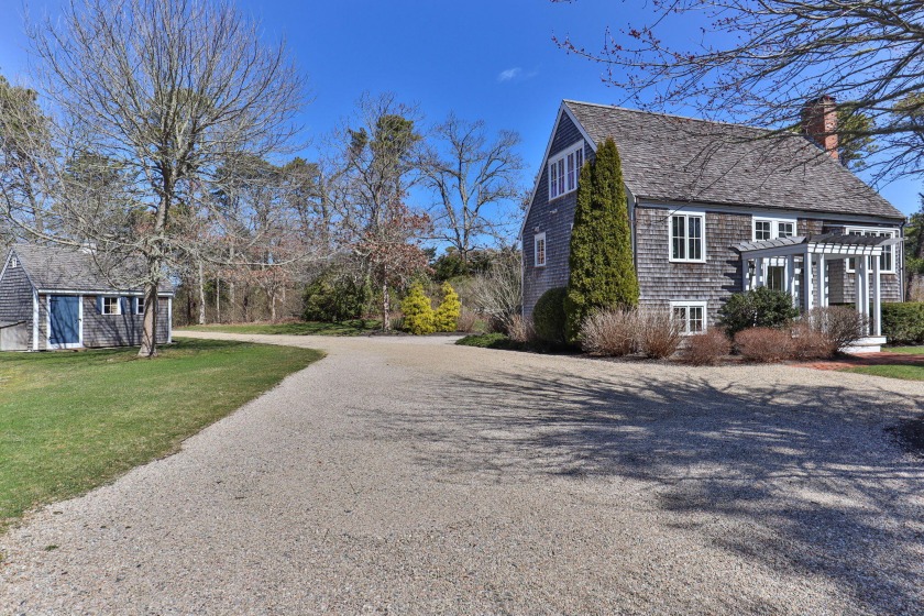 A charming Cape home on a very private, well-maintained 1.27 - Beach Home for sale in North Chatham, Massachusetts on Beachhouse.com