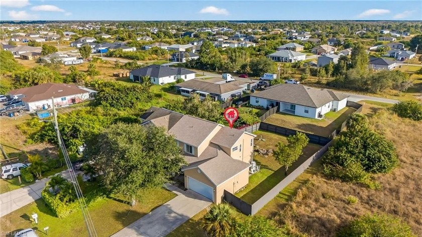 Imagine a home where space, light, and freedom welcome you at - Beach Home for sale in Lehigh Acres, Florida on Beachhouse.com