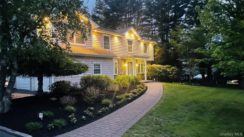 Welcome to this exceptional Center Hall Colonial located in the - Beach Home for sale in Mount Sinai, New York on Beachhouse.com