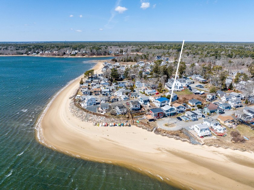 Tucked away in a rustic village setting on Buttermilk Bay, this - Beach Condo for sale in Buzzards Bay, Massachusetts on Beachhouse.com
