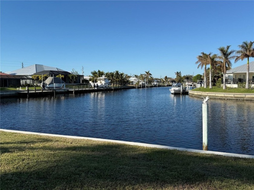 WATERFRONT POOL HOME.......100 foot concrete seawall (maintained - Beach Home for sale in Punta Gorda, Florida on Beachhouse.com