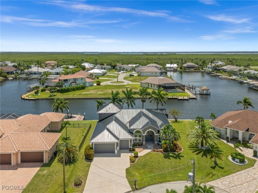 Welcome to 4012 SW 29th Ave, a beautifully renovated Gulf Access - Beach Home for sale in Cape Coral, Florida on Beachhouse.com