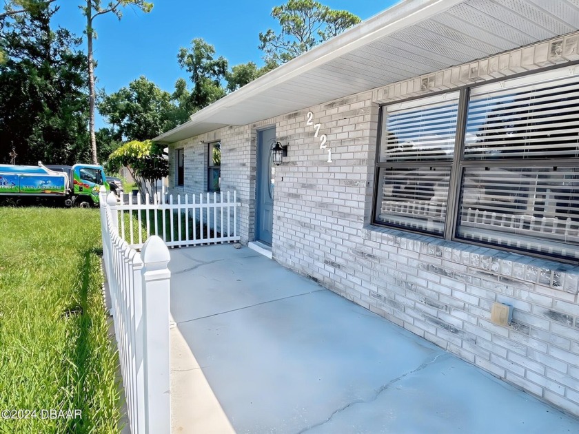 This charming 3-bedroom, 2-bathroom single-family home is - Beach Home for sale in Edgewater, Florida on Beachhouse.com