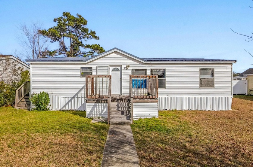 Located near Carolina Forest, this 3 bedroom, 2 bathroom home - Beach Home for sale in Myrtle Beach, South Carolina on Beachhouse.com