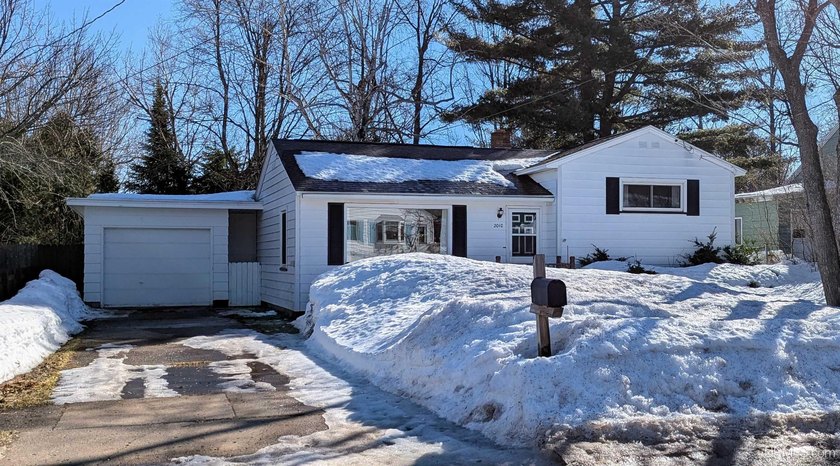This cute 2 bedroom, 1.5 bath home conveniently located near NMU - Beach Home for sale in Marquette, Michigan on Beachhouse.com