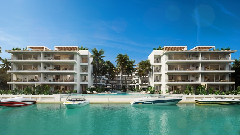 Welcome to Puerto Aqua Home B303, a refined three-bedroom - Beach Condo for sale in Puerto Aventuras,  on Beachhouse.com