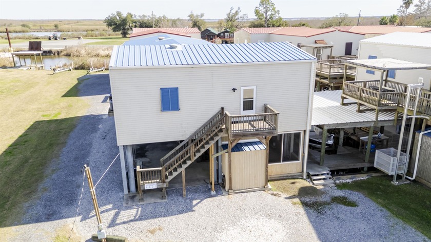 This fully furnished 2-bedroom, 2-bath camp is your home away - Beach Home for sale in Theriot, Louisiana on Beachhouse.com