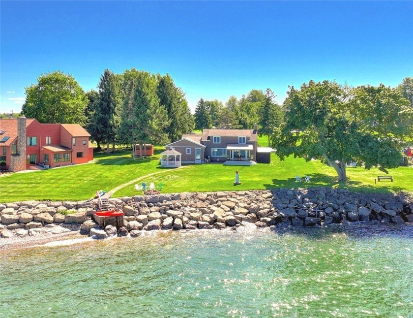 **100 FEET OF LAKE ONTARIO SHORELINE!** METICULOUSLY MAINTAINED - Beach Home for sale in Ontario, New York on Beachhouse.com