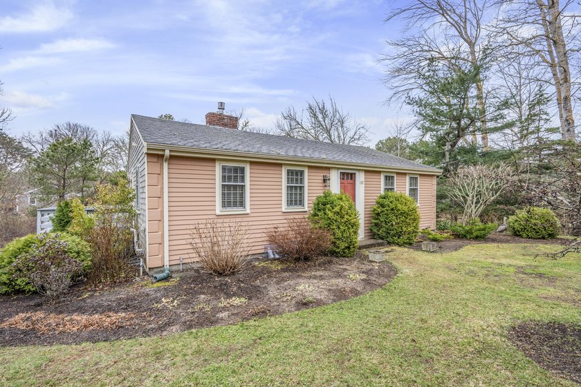 Tucked in a peaceful East Harwich setting with a pond beyond - Beach Home for sale in Harwich, Massachusetts on Beachhouse.com