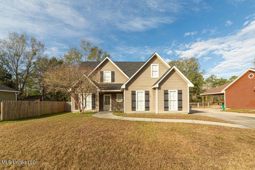 This  3-bedroom, 2.5-bath home, just a stone's throw from the - Beach Home for sale in Waveland, Mississippi on Beachhouse.com