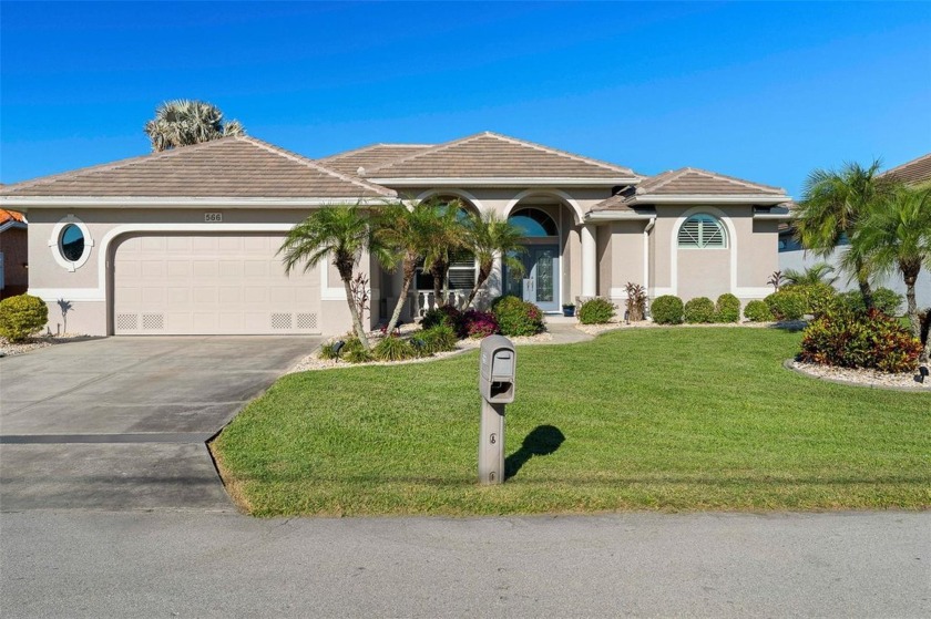 RENOVATED, WATERFRONT HOME IN BURNT STORE ISLES W/***NEW TILE - Beach Home for sale in Punta Gorda, Florida on Beachhouse.com