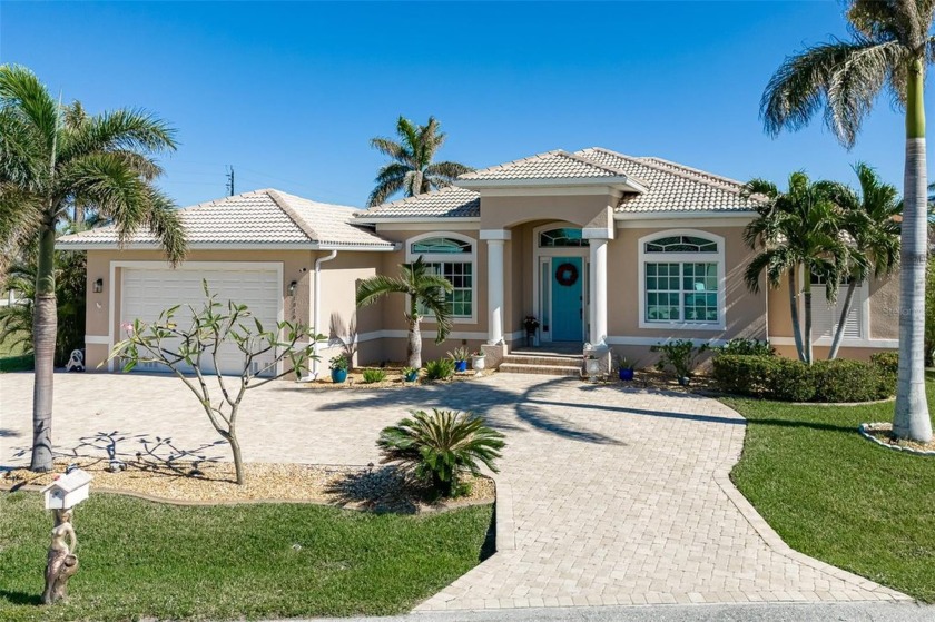 WELCOME HOME TO YOUR CUSTOM-BUILT, WATERFRONT POOL HOME IN PGI! - Beach Home for sale in Punta Gorda, Florida on Beachhouse.com