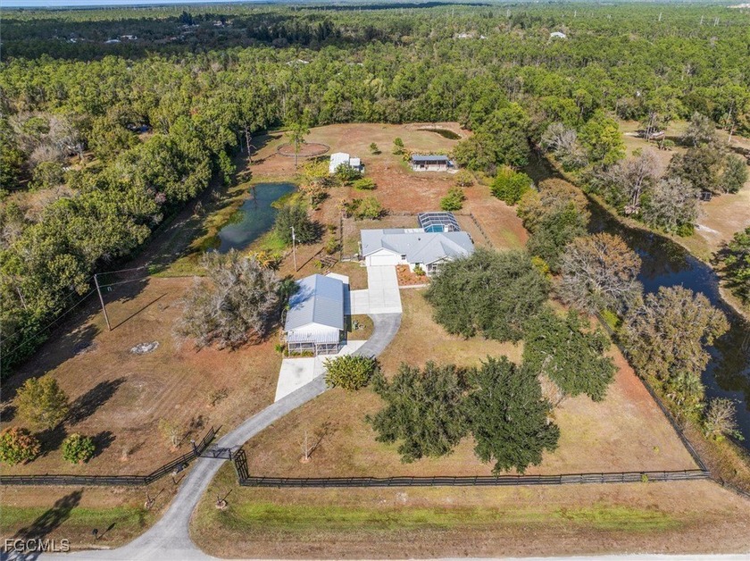 This property has it all! Located on just over 5 ACRES this - Beach Home for sale in North Fort Myers, Florida on Beachhouse.com