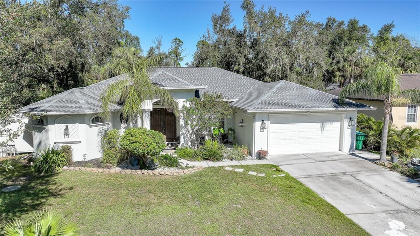 This stunning home captivates from the moment you arrive. The - Beach Home for sale in Port Charlotte, Florida on Beachhouse.com